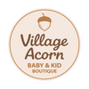 Logo of Village Acorn Baby & Kid Boutique with an acorn icon on a beige background